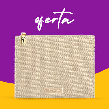Bolsa bege Yves Saint Laurent com textura trançada e fecho dourado sobre fundo roxo e amarelo vibrante.